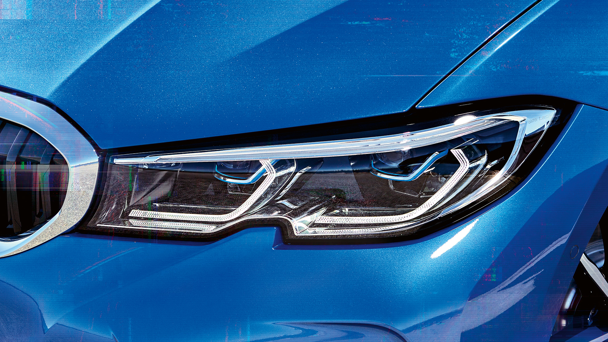 BMW Série 3 Berline, BMW Laser. Gros plan latéral du phare avant droit avec BMW Laser.